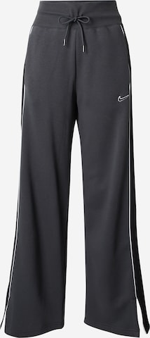 Pantaloni 'FLC PHX' de la Nike Sportswear pe gri: față