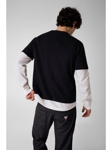 GUESS T-Shirt in Schwarz