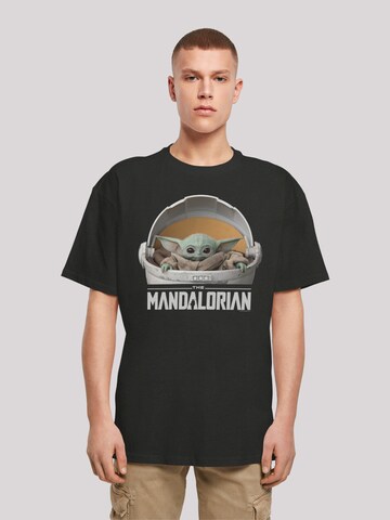 F4NT4STIC Shirt 'Star Wars The Mandalorian The Child Pod' in Black: front