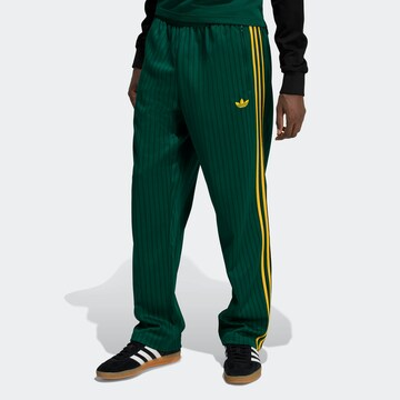 ADIDAS ORIGINALS Loose fit Pants 'Firebird' in Green: front