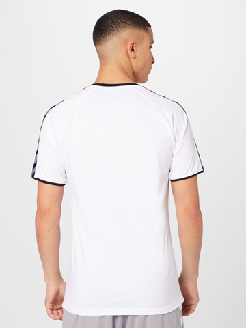 T-Shirt fonctionnel Hummel en blanc