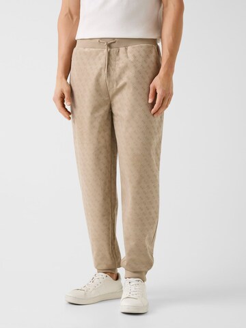 GUESS Tapered Pants in Beige: front