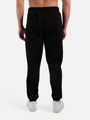 Effilé Pantalon Smilodox en noir