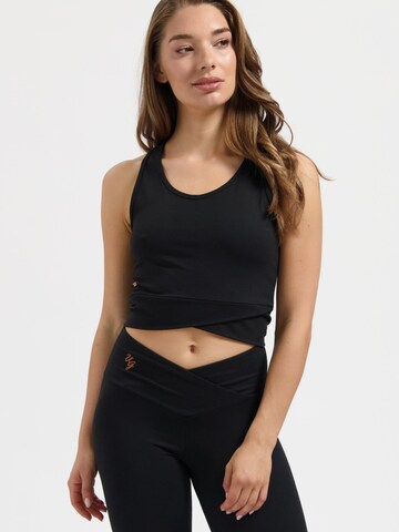 Urban Goddess Yoga & Activewear Sporttop 'Sati Yoga & Pilates' in Schwarz