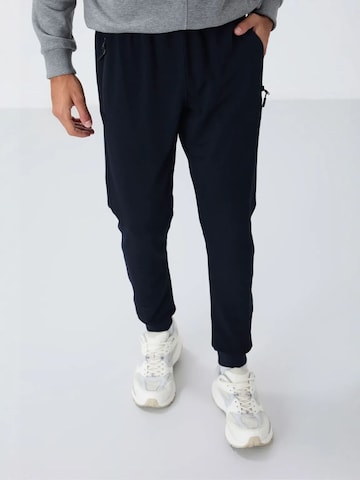 Regular Pantalon de sport Tommy Life en noir
