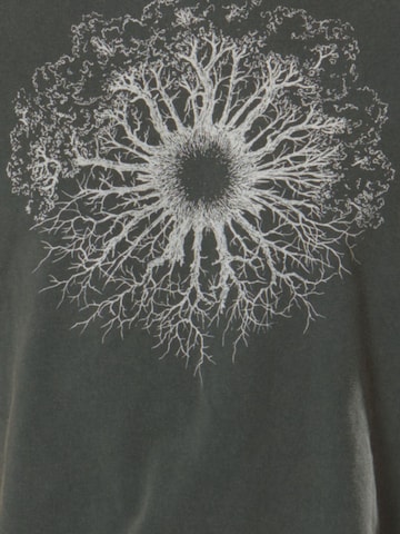 Life-Tree Shirt 'Fairwear Organic  WoodenIris'‌‌‌‌‌ in Grün
