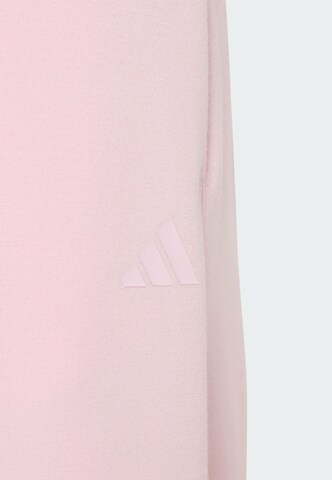 ADIDAS SPORTSWEAR - Loosefit Calças de desporto em rosa