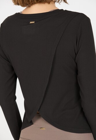 Athlecia Functioneel shirt 'Mandes' in Zwart