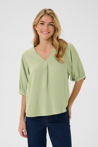Cream Blus i grön: framsida