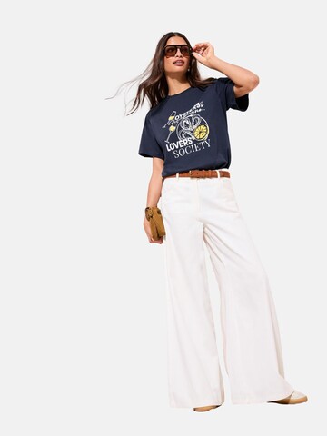 Tricou de la Friends Like These pe albastru: față