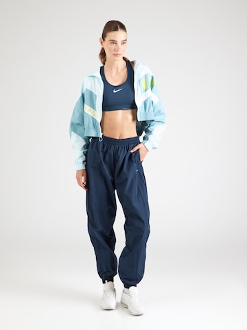Nike Sportswear Tapered Broek 'Essential' in Blauw