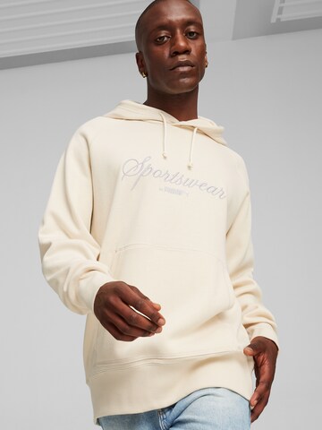 PUMA Sweatshirt 'CLASSICS' in Wit: voorkant