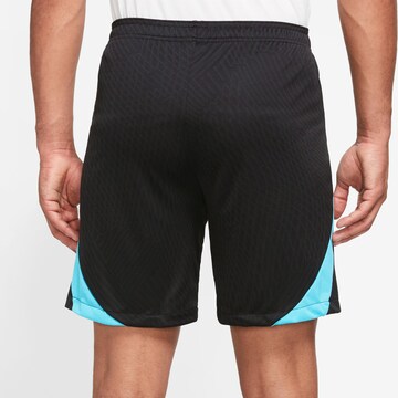 NIKE Loose fit Sports trousers 'Strike' in Black