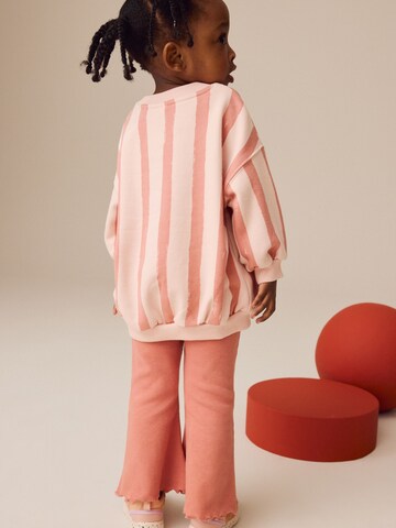 Set Next en rose