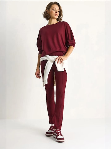 Tuta da jogging di Bianco Lucci in rosso