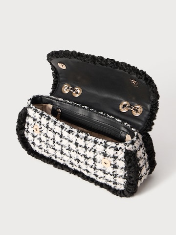 GUESS Τσάντα ώμου 'Christi' σε μαύρο