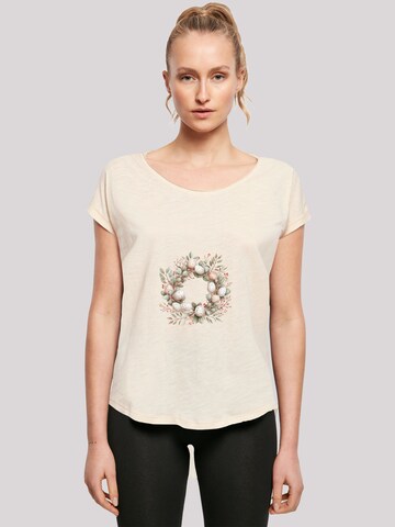 T-shirt 'Osterkranz Eierkranz Blumenring' F4NT4STIC en beige : devant