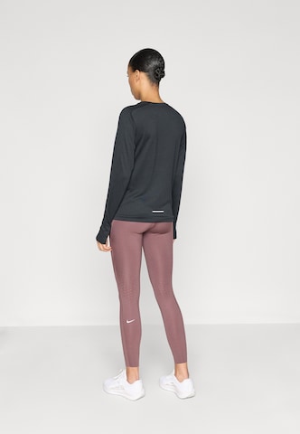 purpurinė NIKE Siauras Sportinės kelnės 'SWIFT'