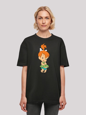 T-shirt oversize 'Familie Feuerstein Pebbles Flintstone' F4NT4STIC en noir : devant