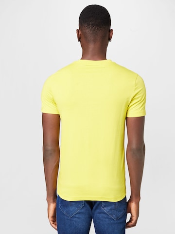Calvin Klein Jeans Koszulka w kolorze żółty