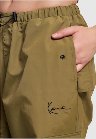 Loosefit Pantaloni di Karl Kani in verde