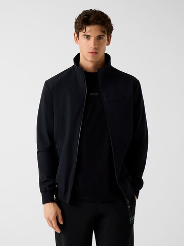 GUESS Between-Season Jacket in Black: front