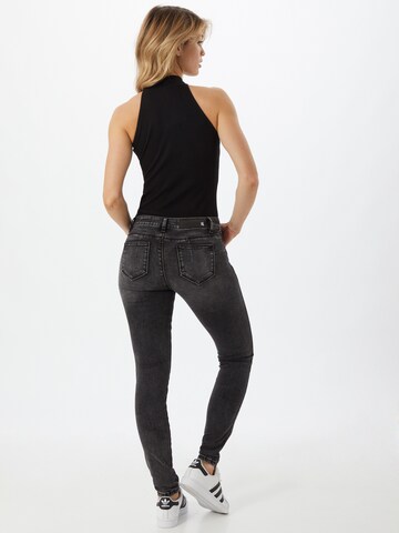 Skinny Jean 'Yuliya' Yellow Blue Denim en gris