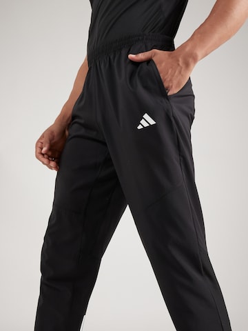 ADIDAS PERFORMANCE Tapered Workout Pants 'Own The Run' in Black