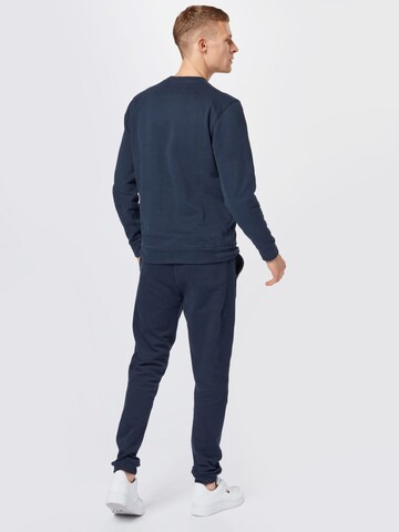 BOSS Orange Tapered Broek 'Skeefast' in Blauw