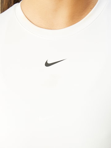 T-shirt fonctionnel 'One' NIKE en blanc