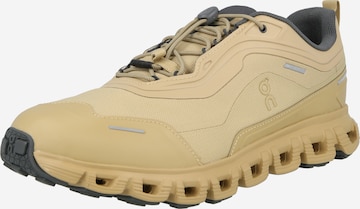 On Trainers in Beige: front