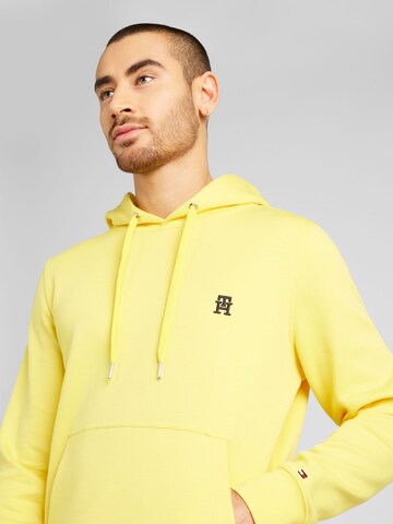 TOMMY HILFIGER Mikina 'MONOGRAM IMD HOODIE' – žlutá