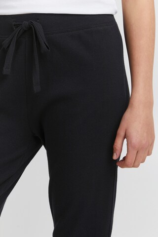 Oxmo - Tapered Pantalón 'Liz' en negro