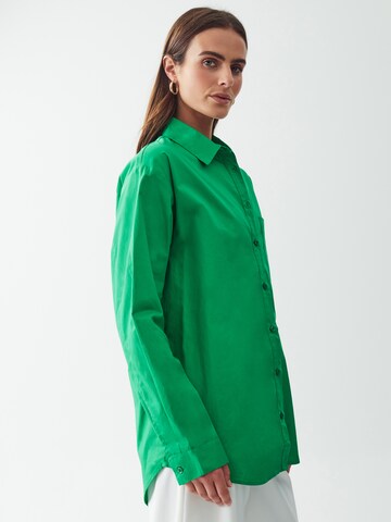 Calli - Blusa em verde: atrás