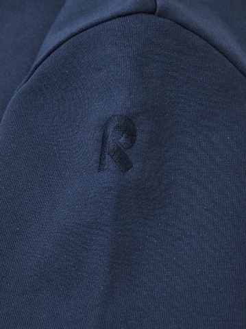 Veste de survêtement ' Huppuri ' Reima en bleu