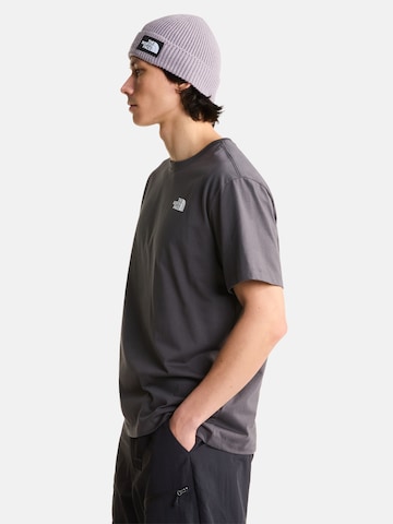 Maglietta 'M MOUNTAIN SKETCH SS TEE RELAXED' di THE NORTH FACE in nero