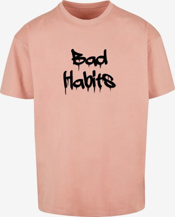 Merchcode T-Shirt 'Bad Habits' in Pink: predná strana