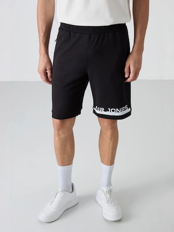 Pantaloni di Tommy Life in nero: frontale