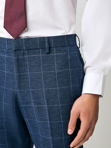 Slimfit Pantaloni con piega frontale di Next in blu