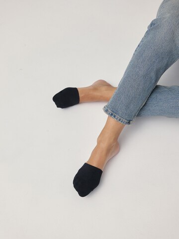 SNOCKS Füßlinge in Schwarz