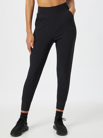 NIKE Tapered Sports trousers 'Bliss Luxe' in Black: front