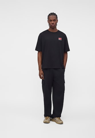 Nike Sportswear Loosefit Hose 'Club Fleece' in Schwarz