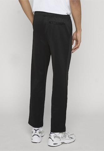 regular Pantaloni sportivi 'Motus' di Pegador in nero