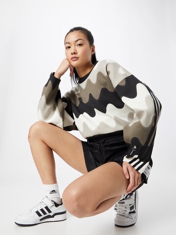 ADIDAS SPORTSWEAR - Sweatshirt de desporto 'Marimekko Future Icons' em castanho