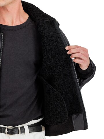 ALPHA INDUSTRIES Winter Jacket 'B-15 Modified' in Black