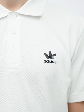 ADIDAS ORIGINALS Majica 'ESS' | črna barva