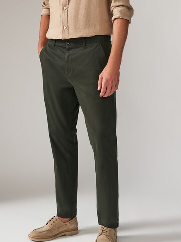 Slimfit Pantaloni chino di Next in verde