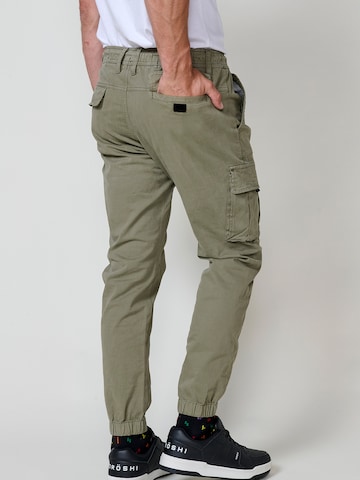 KOROSHI - Tapered Calças cargo em verde