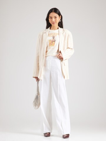 T-shirt 'VINTAGE GIRL' GUESS en beige