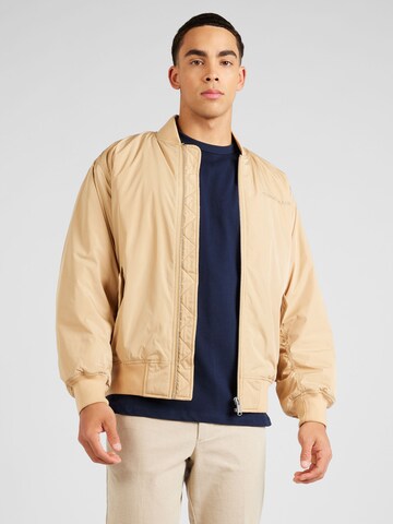 Tommy Jeans - Chaqueta de entretiempo en beige: frente